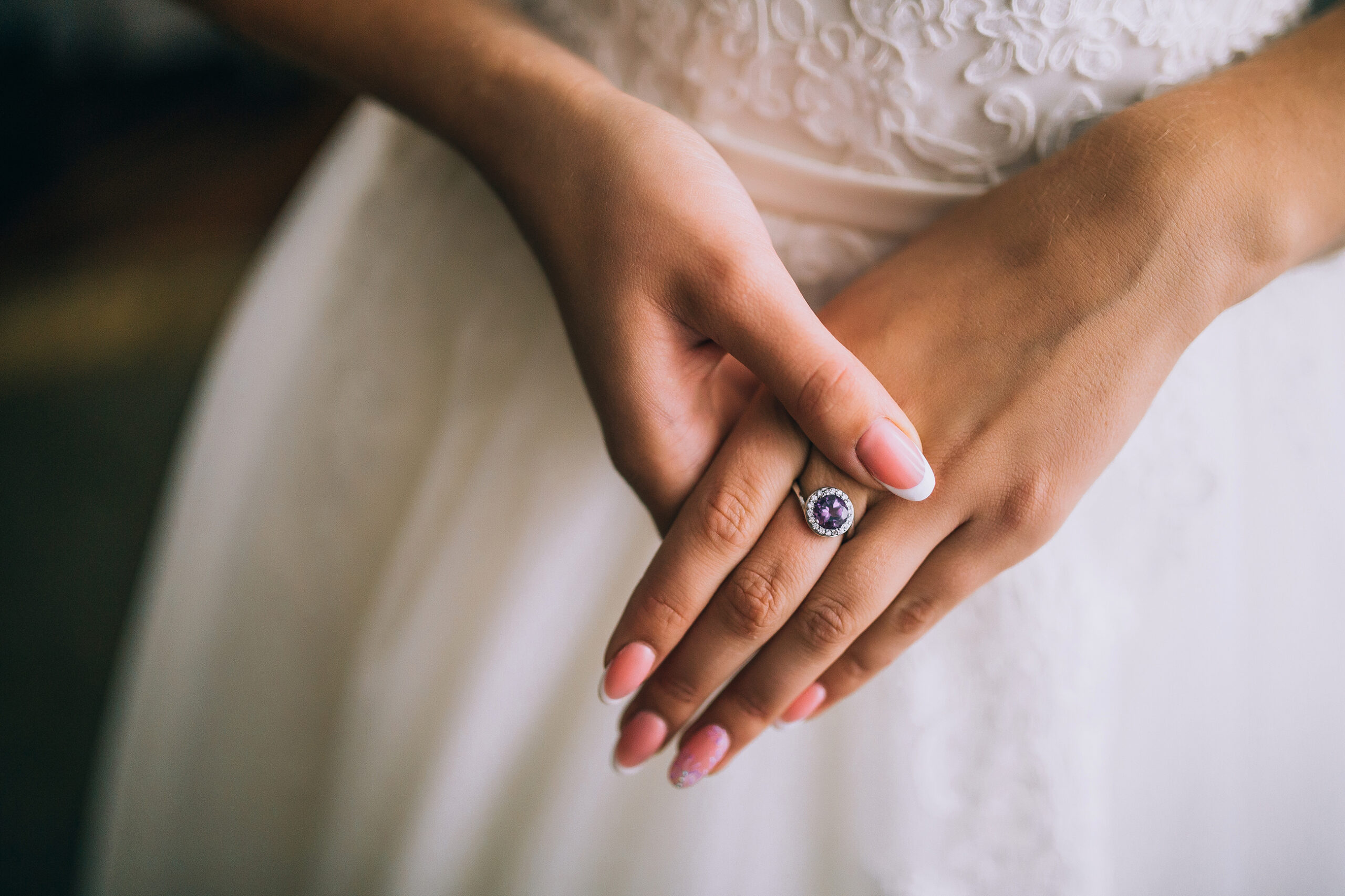 Bride hands with diamond ring