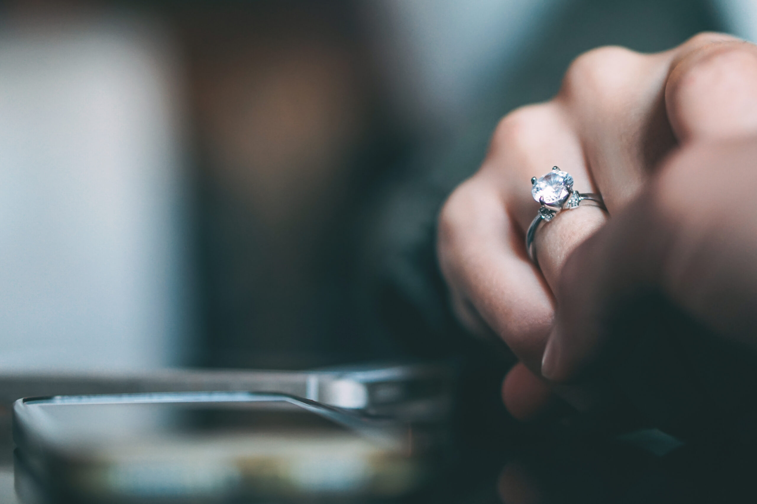 Customer wearing a solitaire diamond ring