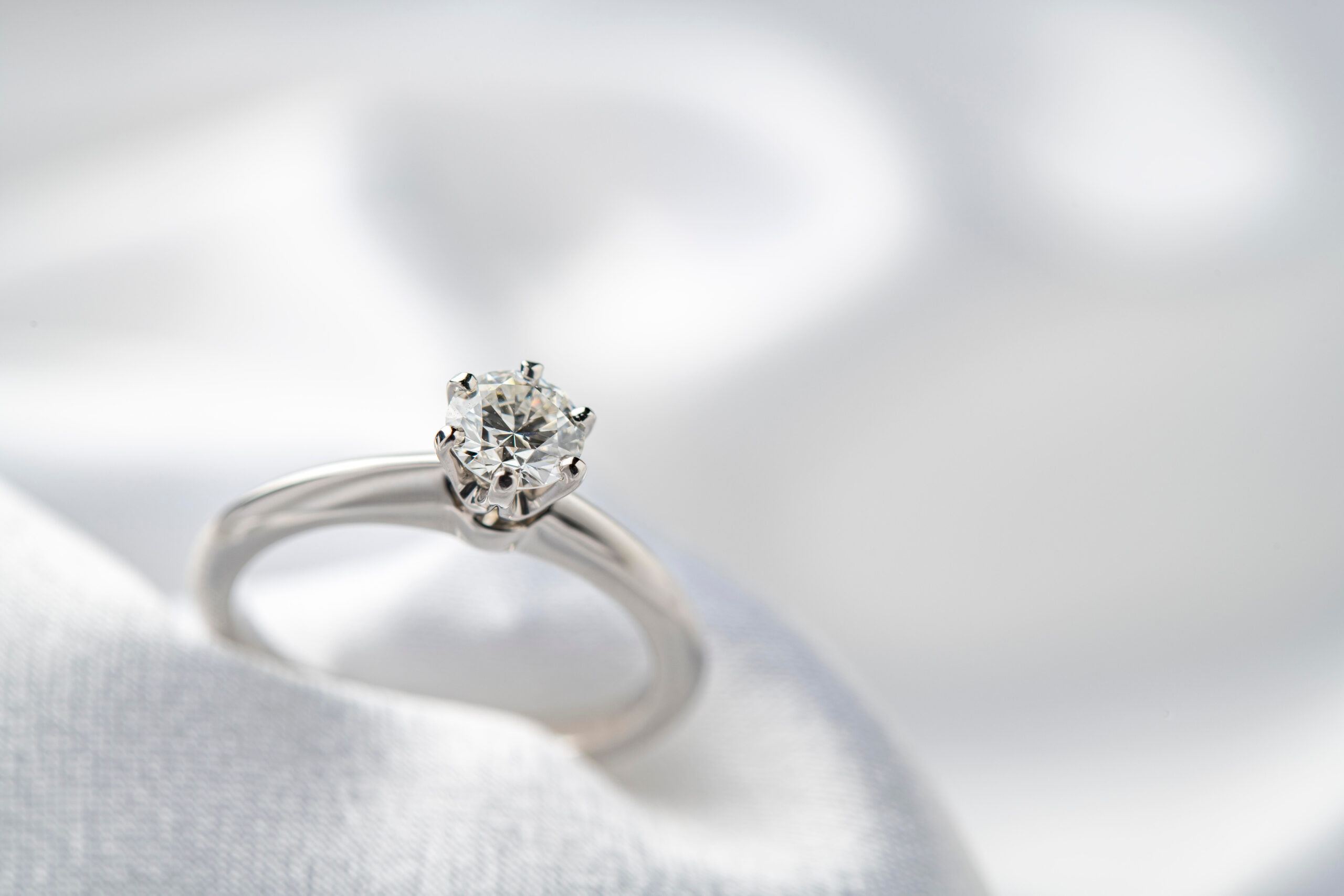 Finished solitaire diamond ring in soft light