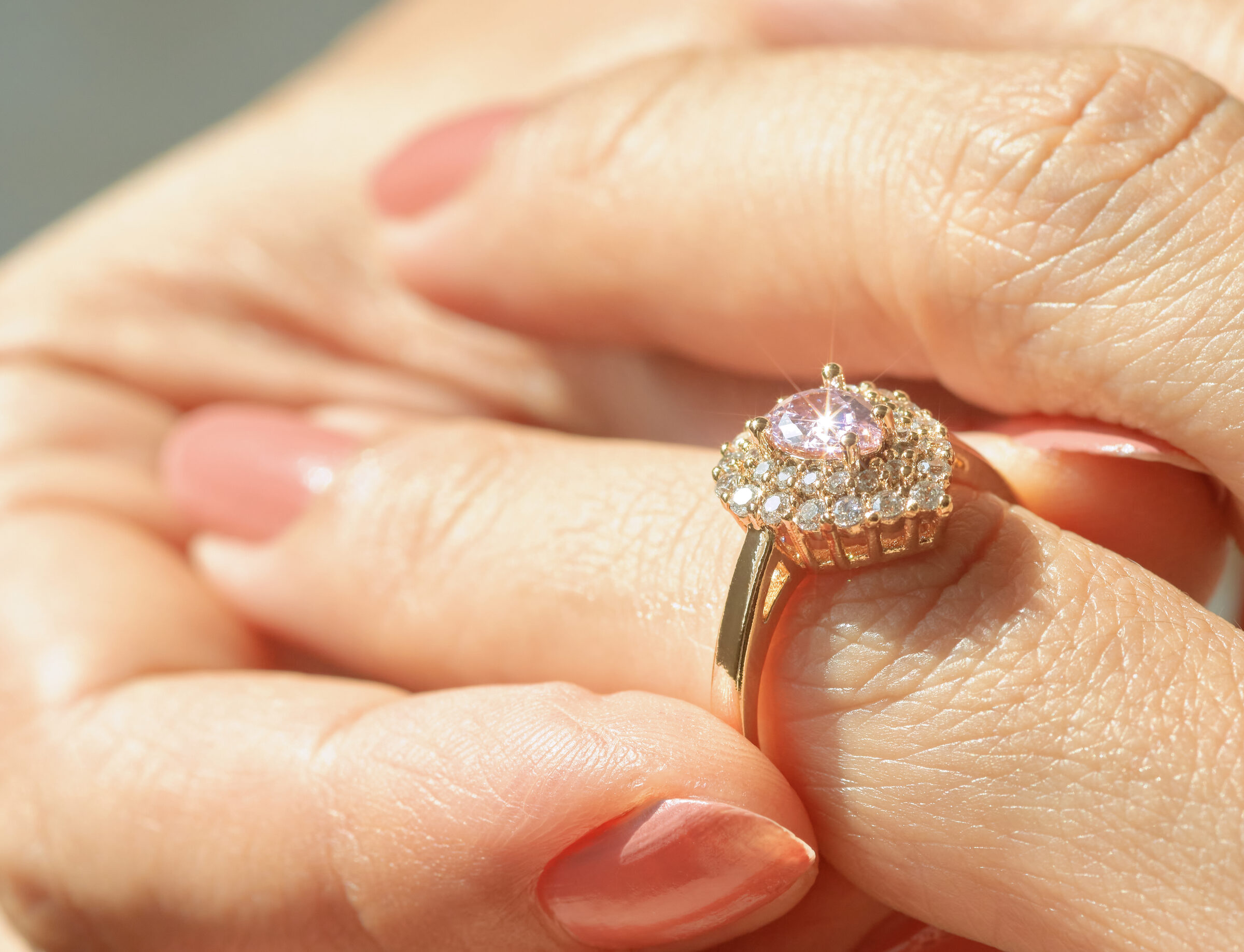 Woman wearing a large diamond ring close up