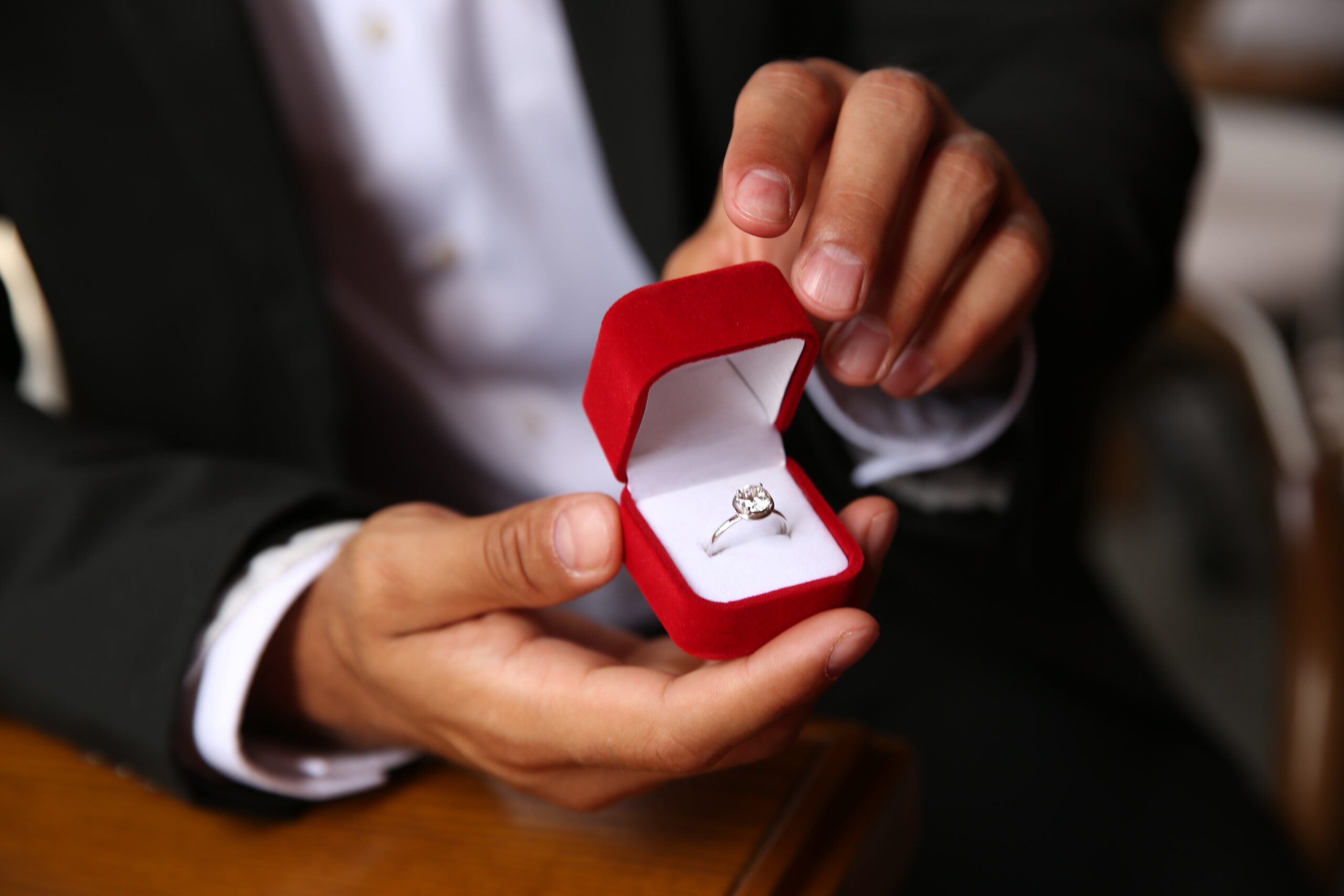 Diamond ring being presented in a jewellery box